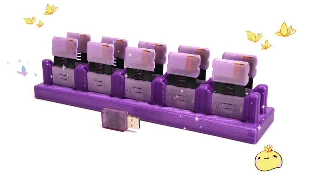 SlimeVR Butterfly Trackers - Manufacturer photograph of prototype Butterfly trackers; production colour and enclosure may change.