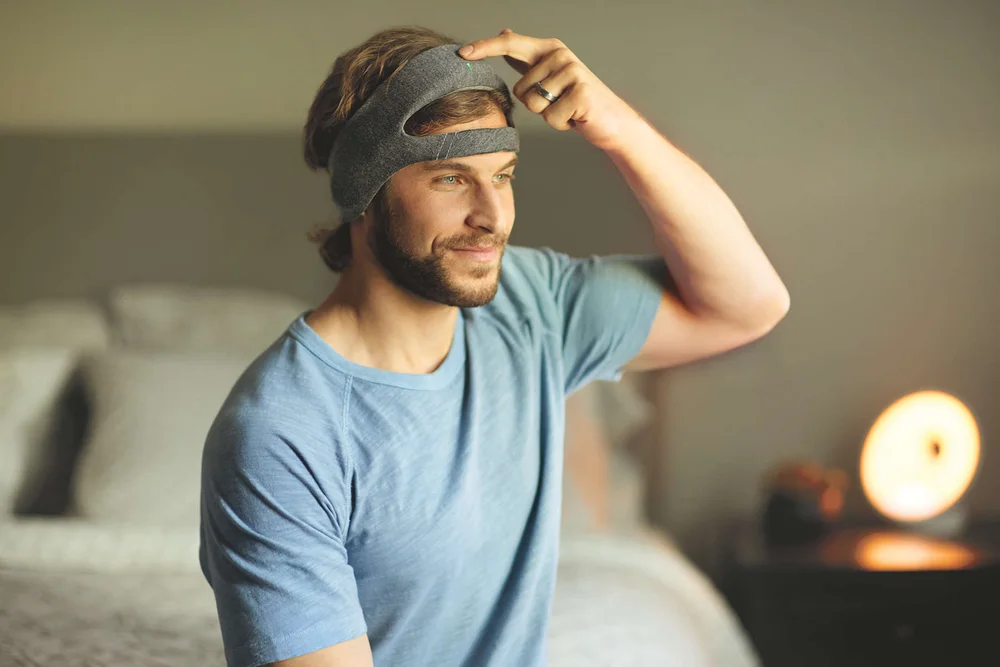 Philips SmartSleep Deep Sleep Headband HH1600 - Philips June 2019 manufacturer photograph of SmartSleep Deep Sleep Headband worn by a user.