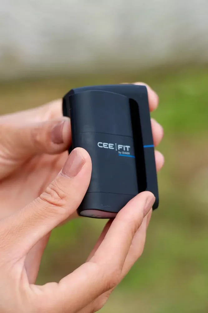 Seaver CEEFIT - Seaver manufacturer photograph of the physical CEEFIT sensor held by a user.